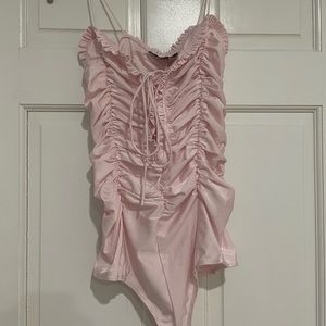 Pink bodysuit size medium